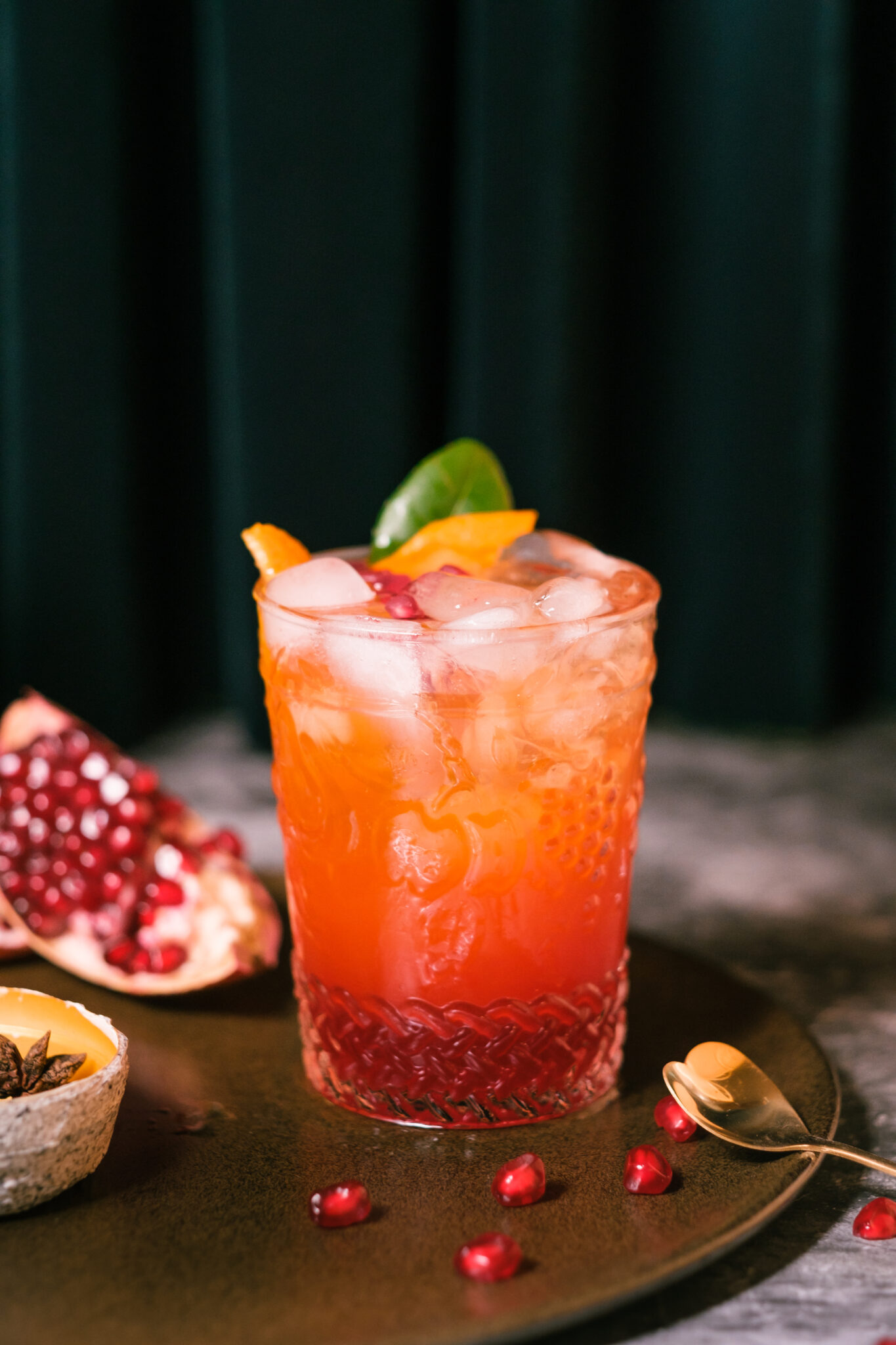 oragne juice mixed with pomegranate cocktail beverage drink on t oragne juice mixed with pomegranate cocktail beverage drink on table